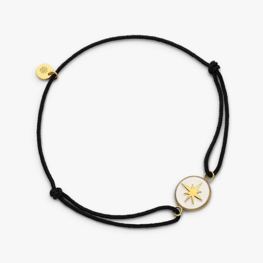 bracelet étoile laque ivoire et or jaune sur cordon noir